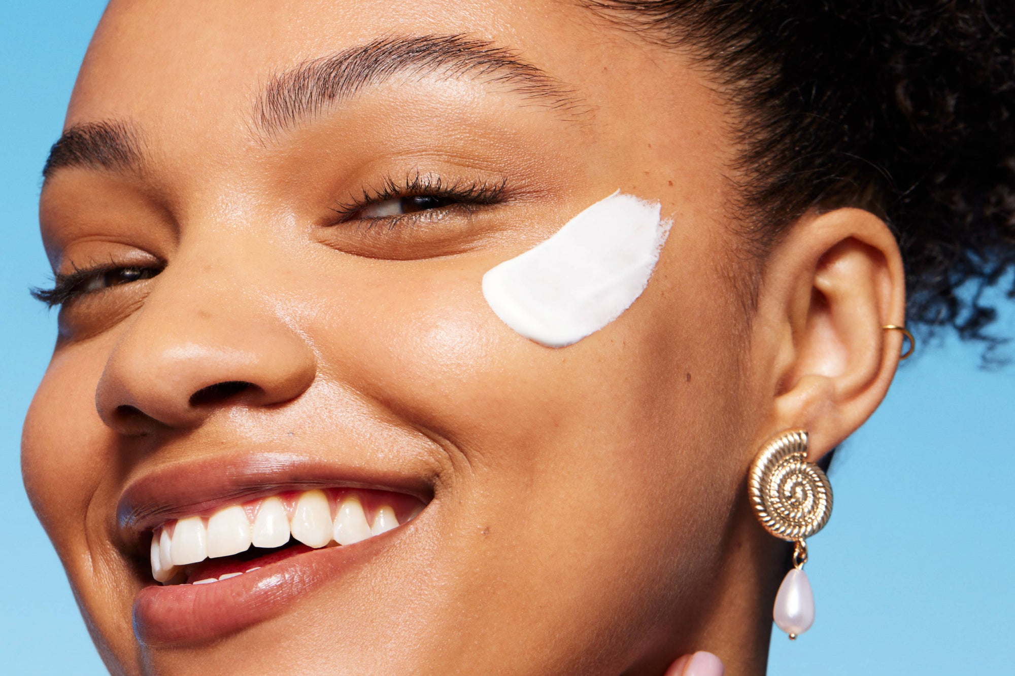 Woman with cream on face