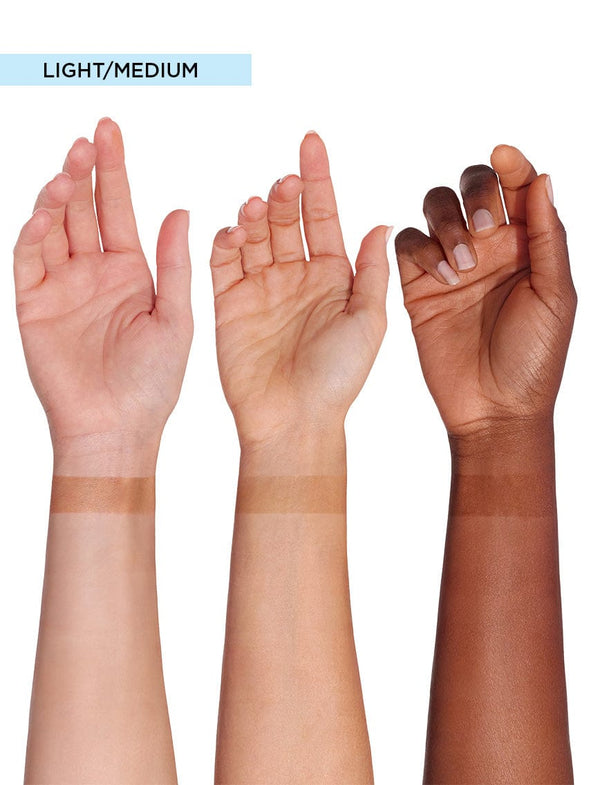 Three raised forearms of varying skin tones display horizontal swatches of BondiSandsEU’s Aero Self Tanning Foam Light/Medium, evoking a bronzed glow against a plain white background.