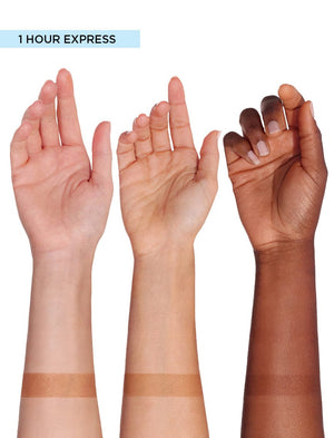 Three raised arms with different skin tones show tan lines on their wrists, highlighting the darker results of BondiSandsEU Aero Self Tanning Foam 1 Hour Express compared to untreated skin.