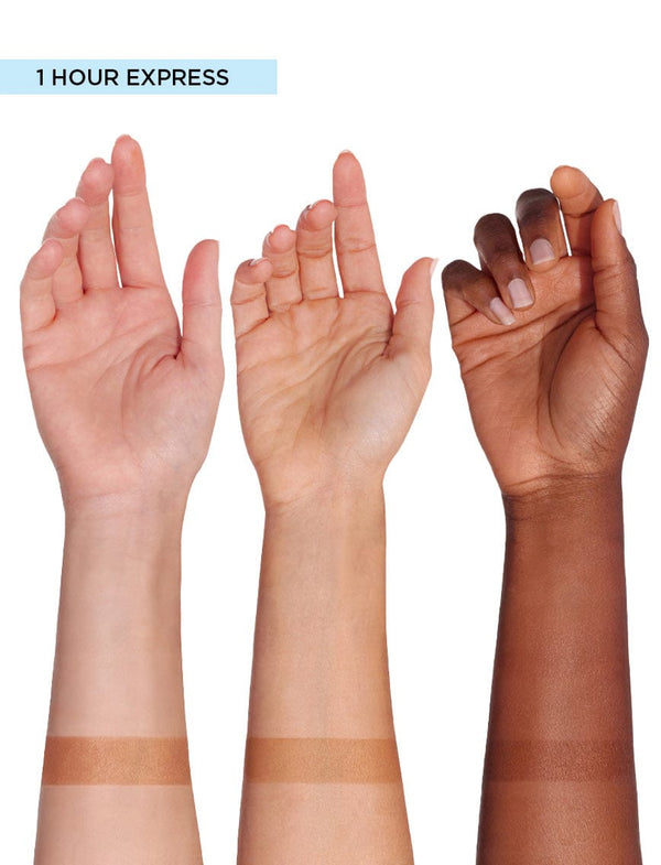 Three raised arms with different skin tones show tan lines on their wrists, highlighting the darker results of BondiSandsEU Aero Self Tanning Foam 1 Hour Express compared to untreated skin.