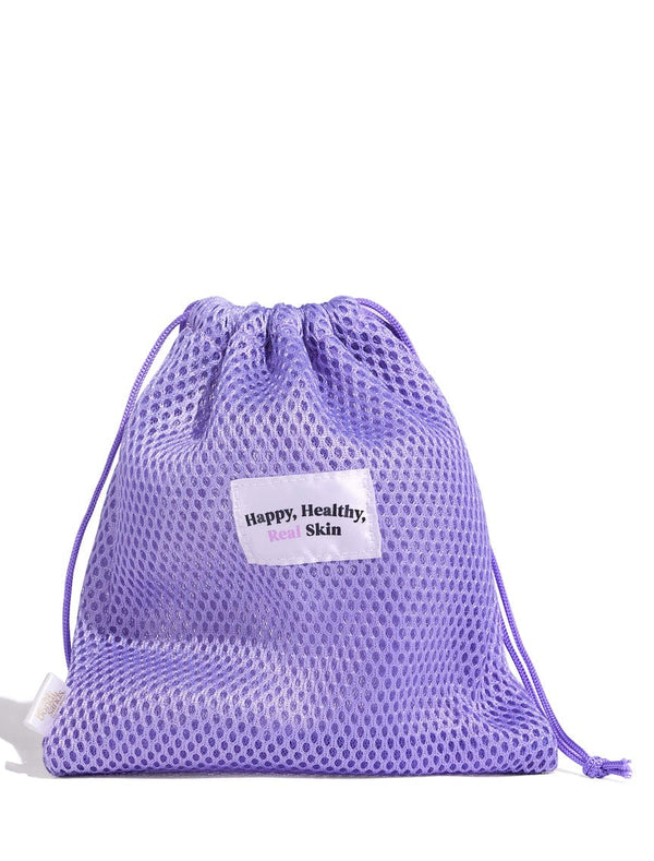 Bondi Sands Squeaky Clean Reusable Makeup Pads in a Purple Mesh Bag