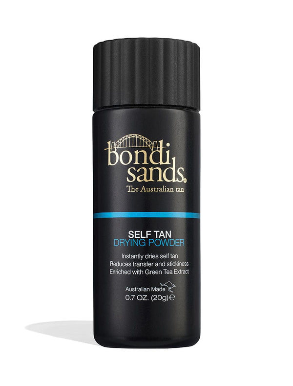 A black cylindrical bottle of BondiSandsEU Self Tan Drying Powder & Brush Bundle features gold and white text, a ribbed black cap, and highlights quick drying, green tea extract, and achieving a flawless tan.