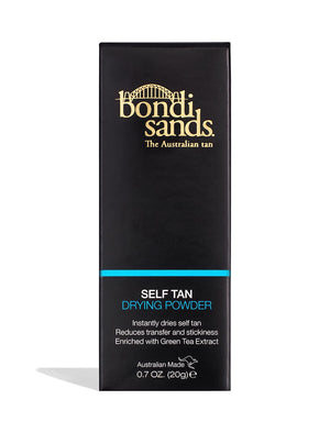 A black rectangular box of BondiSandsEU Self Tan Drying Powder with gold and white text and a blue line; it dries self tan, reduces transfer, and contains green tea extract—ideal for your tanning routine.