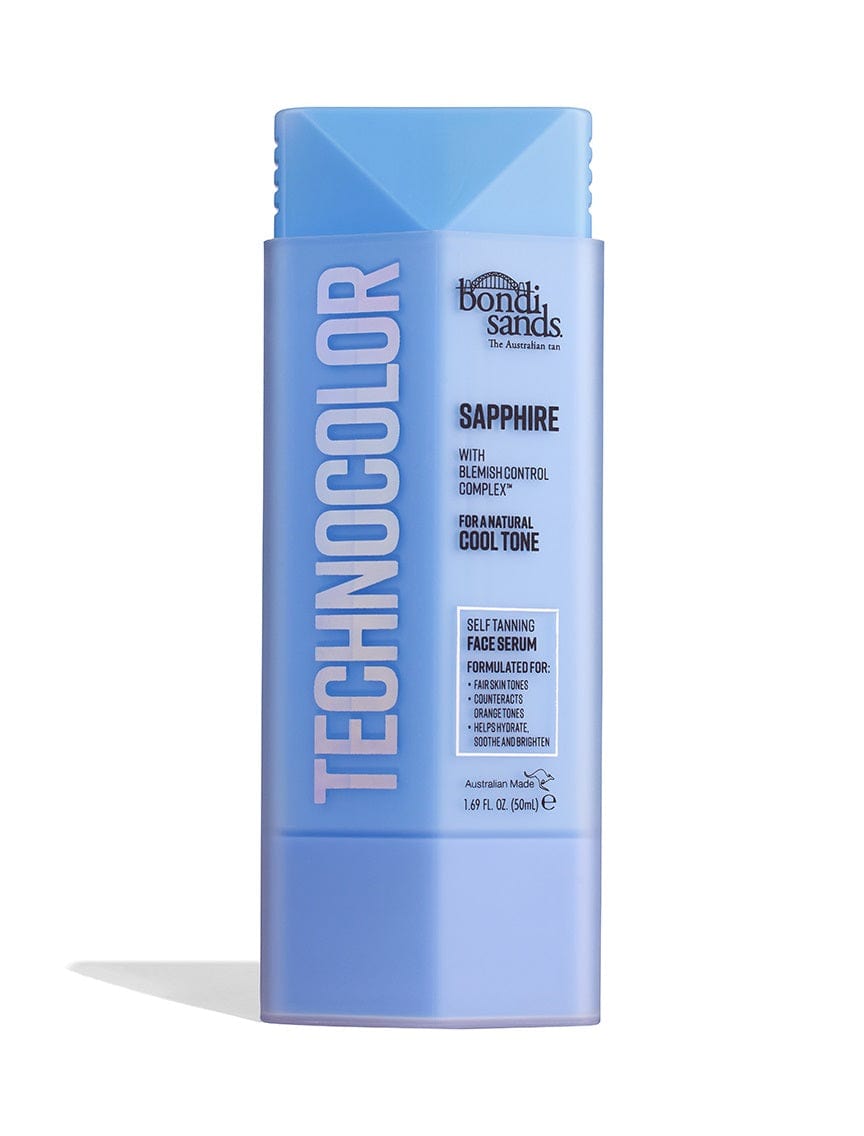 BondiSandsEU Technocolor Sapphire Self Tanning Face Serum provides a natural facial tan and blemish control, with bold vertical TECHNOCOLOR text and product details on its blue bottle.
