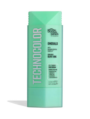 A green bottle of BondiSandsEU Technocolor Emerald Self Tanning Face Serum, made for deep olive and medium skin tones, stands upright with visible branding and details on the label for a natural-looking face tan.