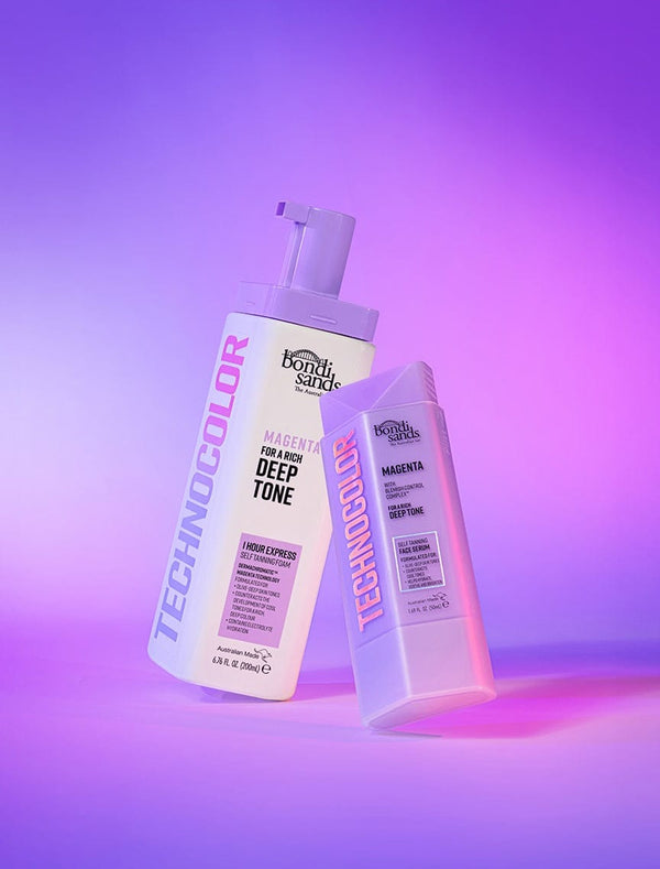 Two BondiSandsEU Technocolor Magenta Self Tanning Face Serums are displayed against a pink and purple gradient background, both labeled for a deep tone.