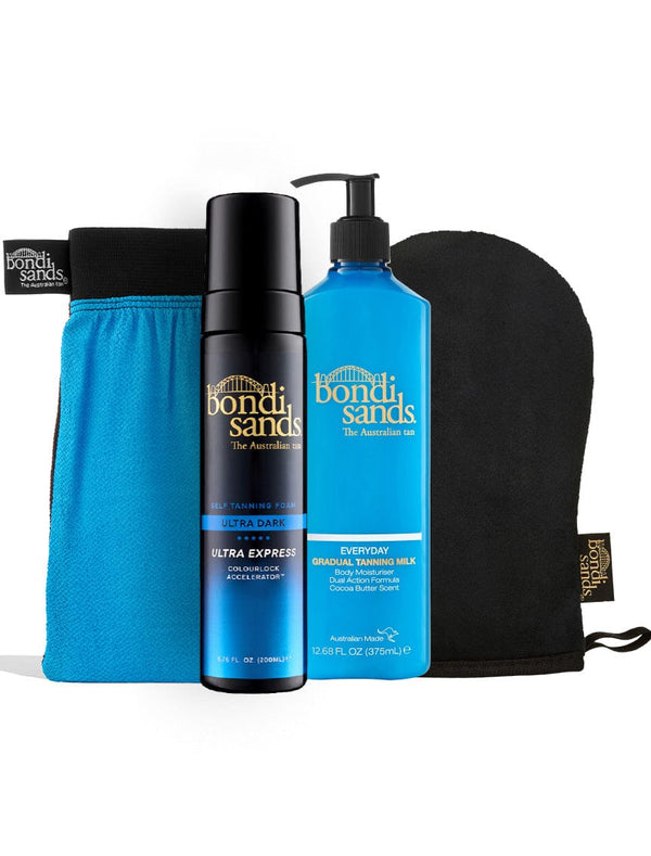 The BondiSandsEU Ultra Express Self Tanning Routine Bundle includes an exfoliating mitt, Ultra Express dark tanning foam, Everyday Gradual Tanning Milk (blue pump), a blue tanning mitt, and a black application glove.