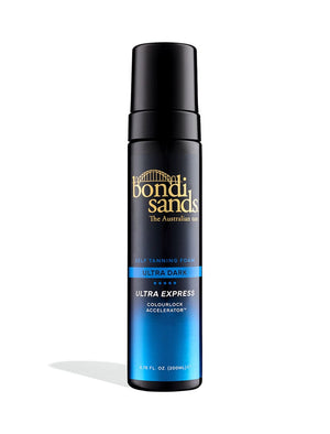A black bottle of Bondi Sands Europe Ultra Express Self Tanning Foam with blue and gold accents and ColourLock Accelerator stands upright on a white background.