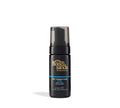 A black BondiSandsEU Starter Bundle bottle with a pump dispenser and clear cap, featuring gold and blue label text. The bottle casts a subtle shadow on a white background. Perfect for teaming with gradual tanning milk.
