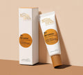 A tube and box of BondiSandsEU Be Bronze Instant Bronzing & Hydrating Serum are displayed on a beige background. The white packaging has orange accents, text, and a screw-on cap, highlighting this hydrating, glow-boosting serum.