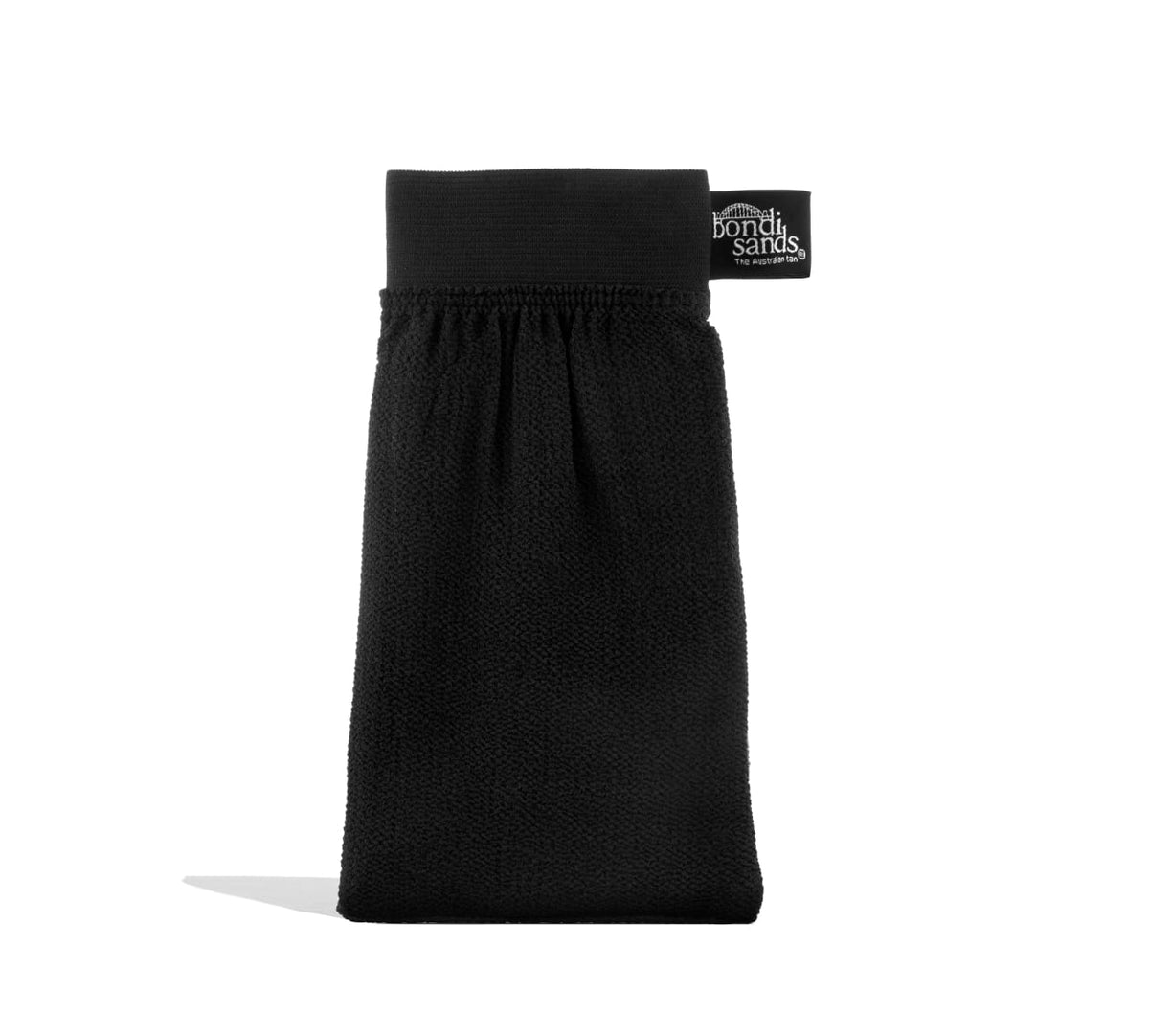 A black BondiSandsEU Exfoliation Mitt stands upright against a white background, featuring a small label and designed to help you achieve a smooth, streak-free glow.