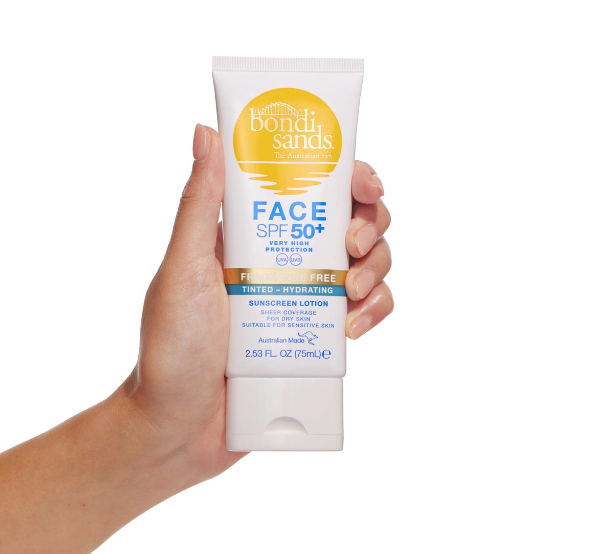 A hand holds a tube of BondiSandsEU SPF 50+ Everyday Hydrating Tinted Face Lotion, with a white and yellow label, blue text, and a sun graphic.