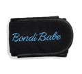 The Light-Medium Get Glowing 3 Piece Starter Kit by Bondi Sands Europe features a black fabric strap embroidered with "Bondi Babe" in light blue cursive—an ideal accessory for streak-free tanning and flawless self tan application.