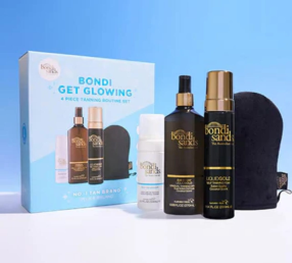 BondiSandsEU Bondi Get Glowing Tanning Routine 4-piece Gift Set shown with self-tanning foam, black mitt, and blue box on a light blue background—the ideal Christmas gift set.