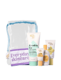 The BondiSandsEU Brightening Besties Gift Set includes a clear pouch with five essentials: a purple headband, Freshn Up gel cleanser, SPF moisturiser, and three mini tubes—Eye Spy, Gold’n Hour, and Sunny Daze.