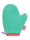 The BondiSandsEU Technocolor Deluxe Self Tanning Application Mitt is bright teal with a thumb, purple trim, and an orange "TECHNOCOLOR" label. Designed for streak-free self tanning. A side tag reads "SONIA KASHUK." Set against a white background.
