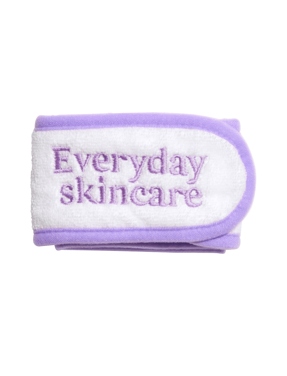 The BondiSandsEU Everyday Skincare Headband is a soft white and lavender accessory with "Everyday skincare" embroidered in purple, perfect for wearing during your skincare routine.