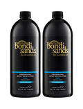 Two large black 1L bottles of BondiSandsEU Ultra Dark Salon Solution, labeled “Dark” with coconut scent, gold and blue accents, and the signature logo. Each tanning bottle contains 35.2 fl. oz.
