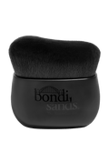 The BondiSandsEU Body Brush features dense, black bristles and a curved handle with the Bondi Sands logo and bridge in black, designed for streak-free blending of self-tanning products. The background is white.