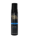A black 200 mL bottle of BondiSandsEU Ultra Dark Self Tanning Foam with gold and blue accents, featuring a coconut scent and advanced tanning actives for a skin-loving tan.