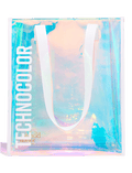 The BondiSandsEU Technocolor Tote Bag features iridescent holographic material, white handles, and TECHNICOLOR printed vertically in bold white letters—a stylish limited edition accessory for any outing.
