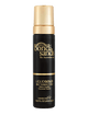 A 200 mL (7.04 fl oz) black and gold bottle of BondiSandsEU Liquid Gold Self Tanning Foam with a gold cap, labeled salon-quality self-tanner with a coconut scent for a golden glow.
