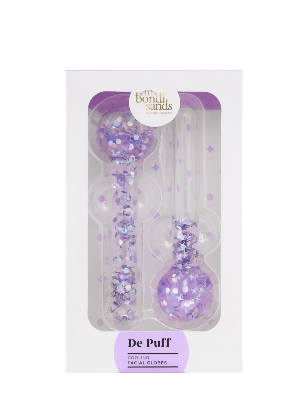 Box containing two BondiSandsEU De Puff Cooling Facial Globes—purple, glitter-filled tools designed for facial massage to reduce puffiness and support lymphatic drainage, packaged in a white box with purple accents and confetti inside the globes.