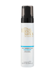 A white bottle of BondiSandsEU Light-Medium Self Tanning Foam with a black pump dispenser. The label indicates its light/medium shade, coconut scent, and salon-quality formula. This self-tanning foam is crafted to deliver a natural glow and flawless finish. Bottle size: 6.76 fl oz (200 mL).
