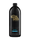 A black 1-liter bottle of BondiSandsEU Salon Solution Ultra Dark, designed for professional tanning results, features gold and blue label text and an image of the Sydney Harbour Bridge.
