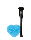 The Self Tan Contour Kit by BondiSandsEU includes a black contour brush and a blue, heart-shaped makeup sponge featuring "Its Glow Time!" in white lettering—essential tools for creating a bronzed, sculpted glow.