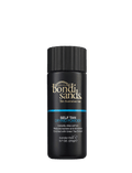 A black 0.7 oz (20g) bottle of BondiSandsEU Self Tan Drying Powder with gold and white text displays the brand logo and product details. Enriched with green tea extract, this powder is an essential step in your tanning routine for a flawless finish.
