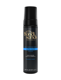A 200 mL black bottle of BondiSandsEU Ultra Dark Self Tanning Foam, featuring gold and blue label text that highlights its coconut scent and quality formula for a natural glow and long-lasting tan.
