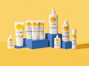 BondiSandsEU SPF 50+ Everyday Tinted Face Fluid is displayed on blue blocks against a yellow background, featuring white packaging with yellow and blue labels.