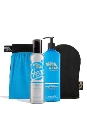 The BondiSandsEU Aero Dark Self Tanning Routine Bundle includes a blue mitt, black and blue mitt, Aero self tanning foam, and Everyday Gradual Tanning Milk—everything you need for a flawless self-tanning routine.