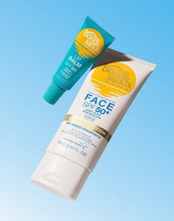 Two BondiSandsEU sunscreen products on a blue background: a hydrating SPF 50+ Lip Balm Sweet Vanilla tube and a white tube of face sunscreen labeled Face SPF 50+ Daily Moisturising.