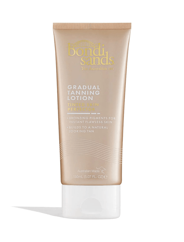 An upright beige tube of BondiSandsEU Gradual Essentials Bundle, with gold and white text on a white background, displays product details and branding for glowing skin.