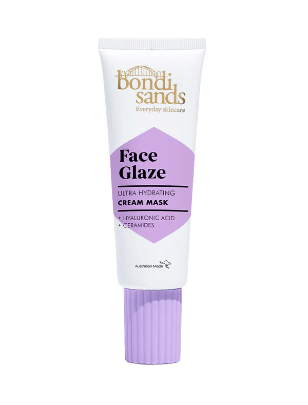 A white tube of BondiSandsEU Face Glaze Cream Mask with a purple cap and label, featuring hyaluronic acid and ceramides for hydrated, dewy skin, is displayed against a plain light background.