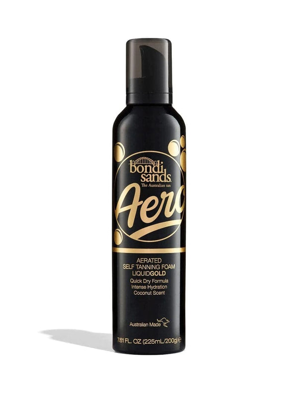 A black 7.61 fl oz Aero Self Tanning Foam Liquid Gold bottle by BondiSandsEU with gold and white text, coconut scent, and pump top. Includes an application mitt for an even, flawless tan.