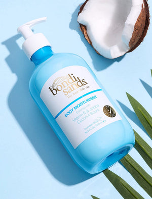 Bondi Sands Coconut Scented Body Moisturiser Flat Lay with Coconut Fruit