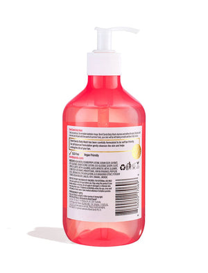 A clear pink plastic pump bottle of BondiSandsEU Summer Fruits Body Wash with a white dispenser shows the back label featuring symbols for 95% natural origin, aloe vera, and vegan friendly. The bottle is set on a white background.