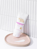 Bondi Sands Tropical Rum Scented Moisturiser Lifestyle Bathroom Image with Swatch