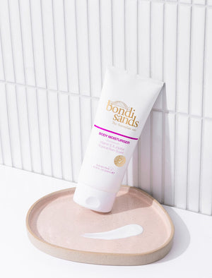 Bondi Sands Tropical Rum Scented Moisturiser Lifestyle Bathroom Image with Swatch