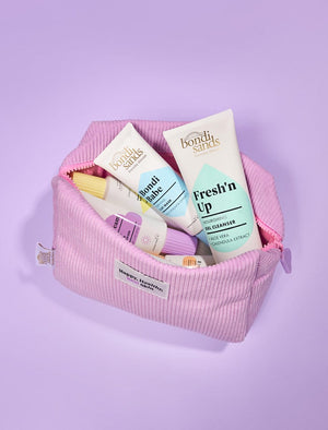 Bondi Sands Everyday Skincare Cosmetic Bag Lifestyle Image with Everyday Skincare Range