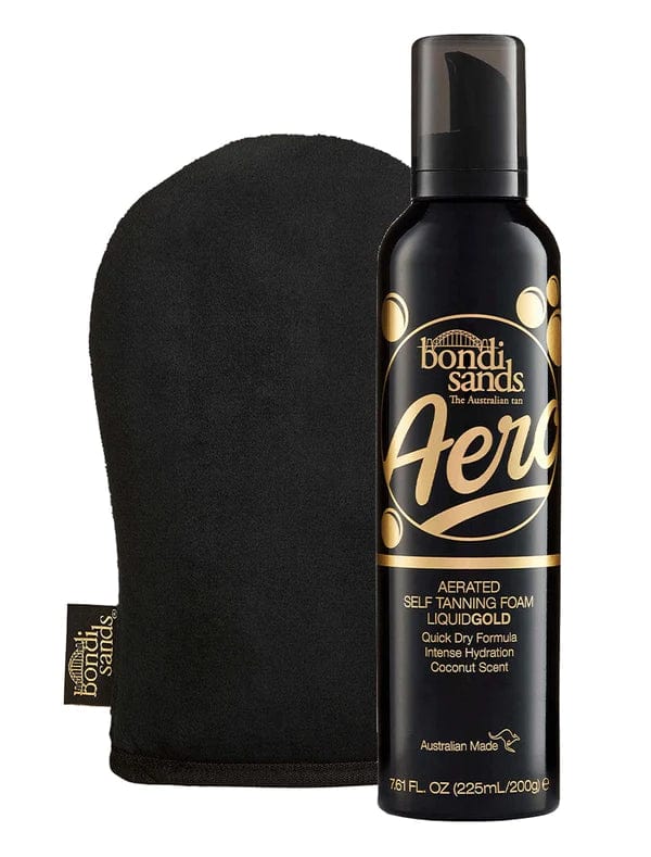 The BondiSandsEU Aero Self Tanning Foam Liquid Gold & Application Mitt Bundle is shown, featuring gold and white accents on the bottle and a coconut scent label, alongside a black mitt.